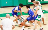 Moriarty's Sam Pearce looks for an open player for a pass.